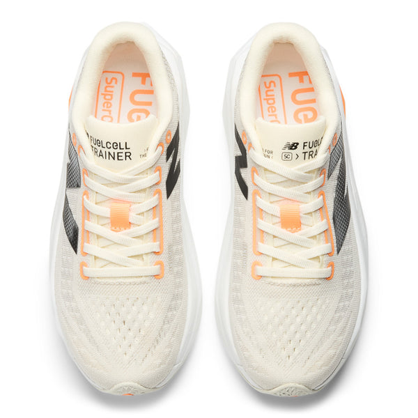 This NB runnig shoe is mostly all white except a little bit of yellow pops.