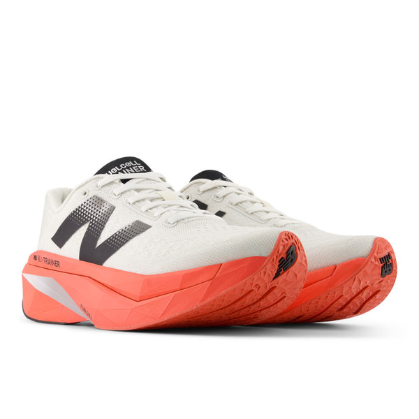 White and orange NB running shoes shoes with black accents on a white background.