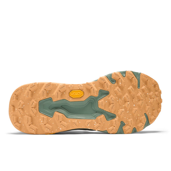 The outsole of this trail runnig shoe has Vibram and specks with lots of lugs.