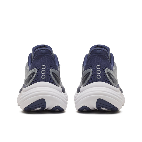 Navy and gray athletic shoes on a white background