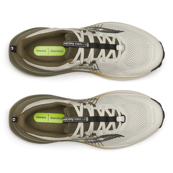 White and brown running shoe with visible branding on a white background