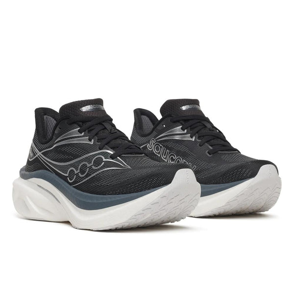 Black, white, and silver running shoe n a white background