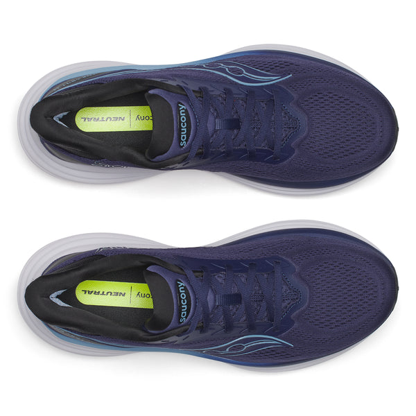 Navy running shoes with white soles on a white background