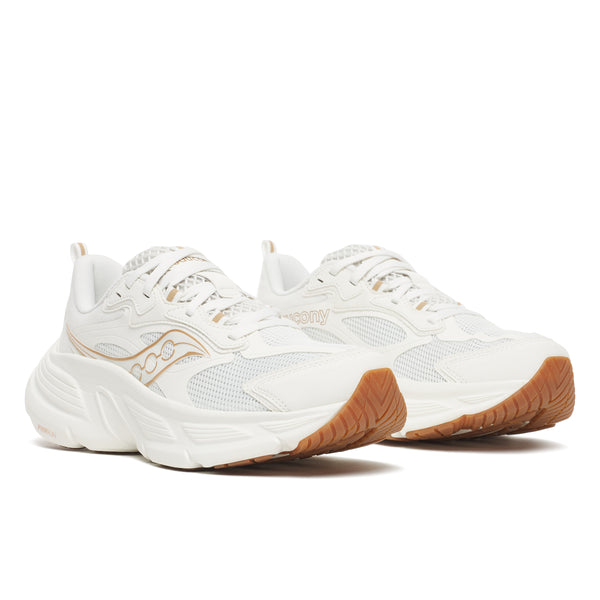 White sneakers with brown soles on a white background