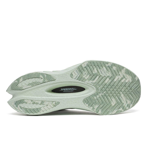 Green running shoe with 'SpeedRoll' technology label on a white background.