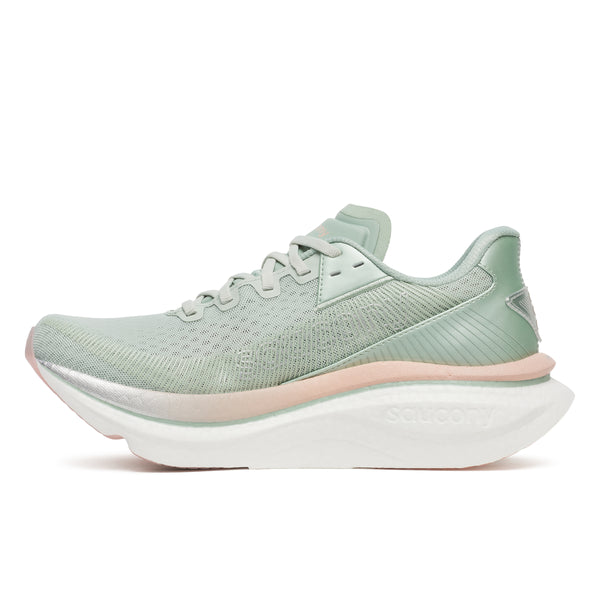 Light green running shoe on a white background