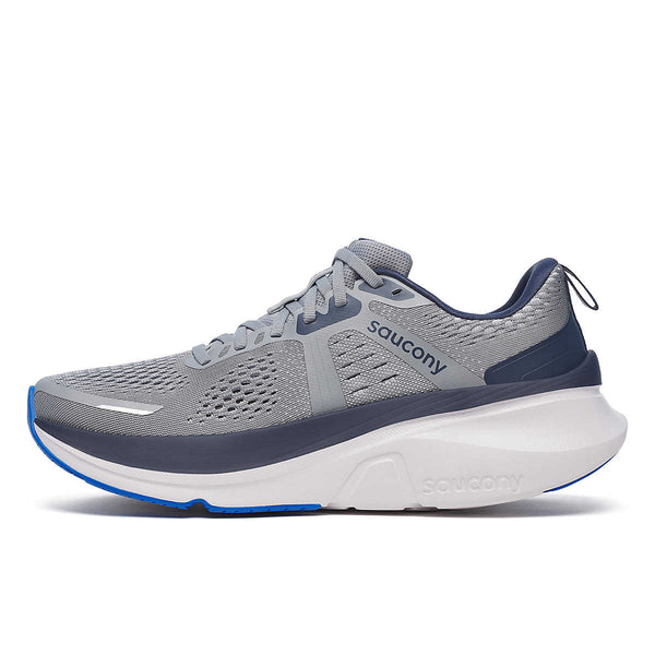 The medial side of a gray and blue running shoe with white sole on a white background.