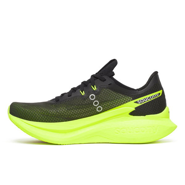 Black and neon green running shoe on a white background