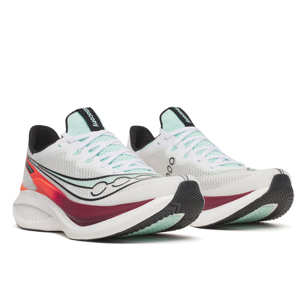 Pair of Saucony running shoes on a white background