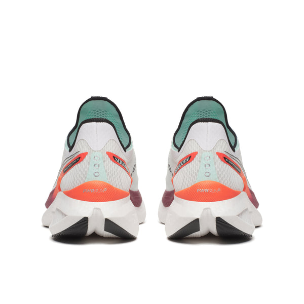 Pair of Saucony running shoes with a white sole and colorful accents on a white background