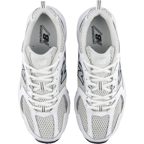 White athletic shoe with gray accents on a white background