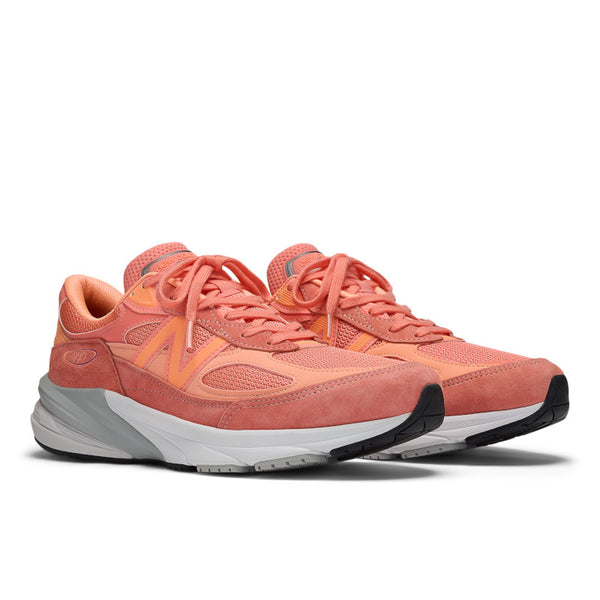 The laces of this New Balance 990 V6 are the same orange color as the upper.
