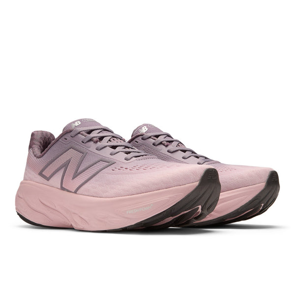 This running shoe has an ombre look that fades from white to a light red wine color.