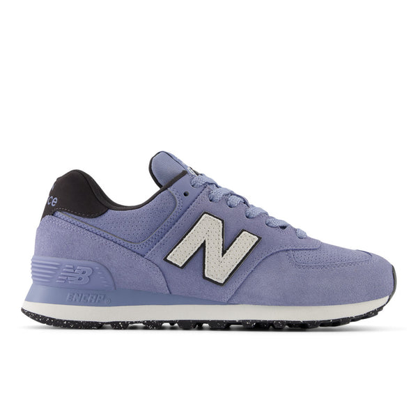 This women's 5734 from NB has a bright white N logo and a speckled black outsole.