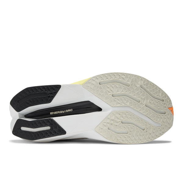 The outsole of a NB running shoe with an Energy Arc under the midfoot.