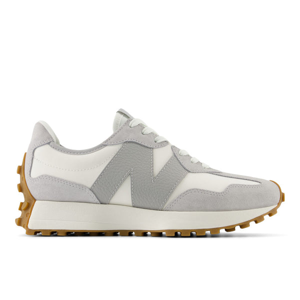 This women's lifestyle sneaker has a gum rubber outsole and a big N logo for New Balance.