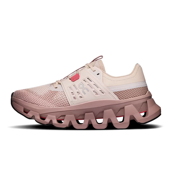Pinkish running shoe with a unique sole design by On with a white background