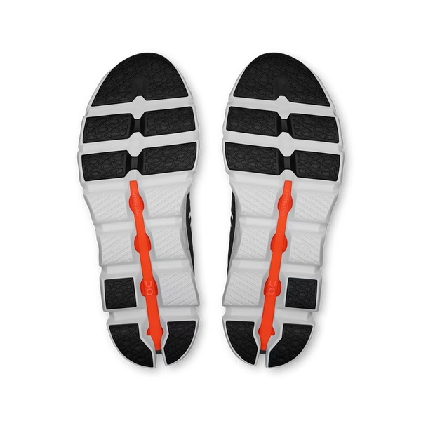 A gray On running shoe with a chunky white and gray CloudTec sole, shown on a white background.