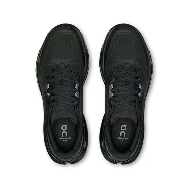 A pair of black On running shoes shown from a top-down view on a clean white background.