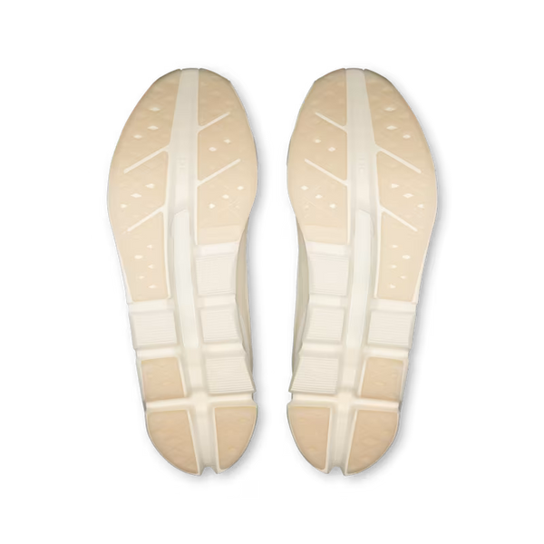 A pair of beige athletic shoe soles shown from a top-down view on a plain white background.