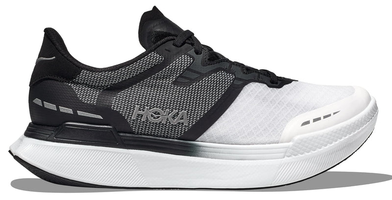 Lateral view of the HOKA Unisex Transport X in Black/White