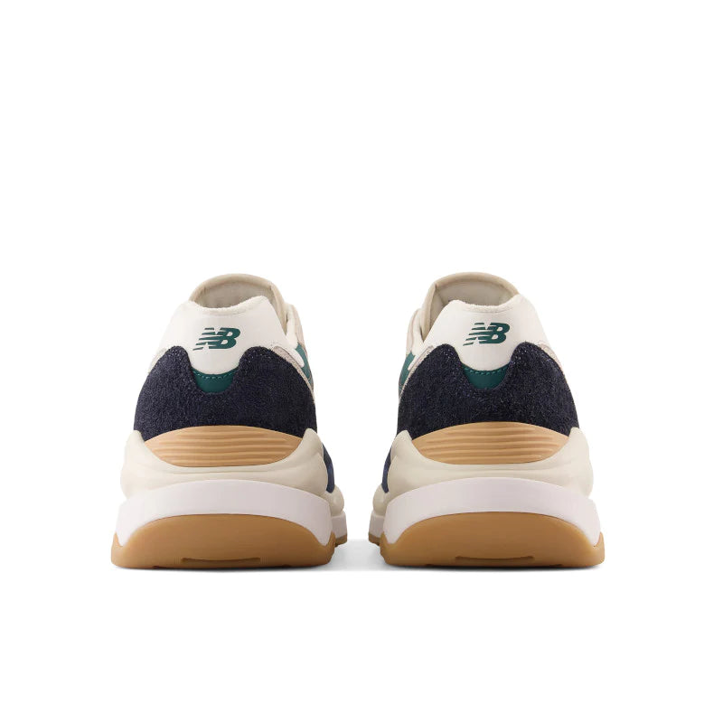 Back view of the Men's New Balance 5740 Lifestyle shoe in the color Blue/Black/Peach