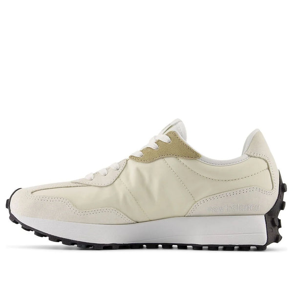 Beige sneaker with white sole on a white background