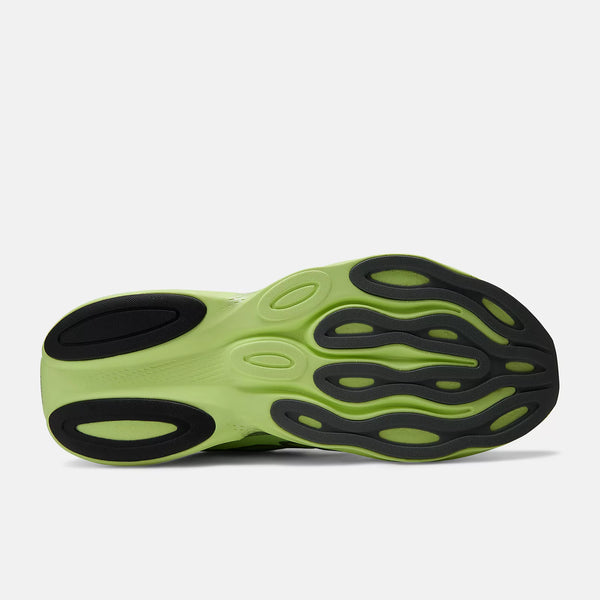 Green and black shoe sole on a white background