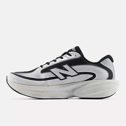 A New Balance running shoe in white, black, and gray, shown against a plain white background.