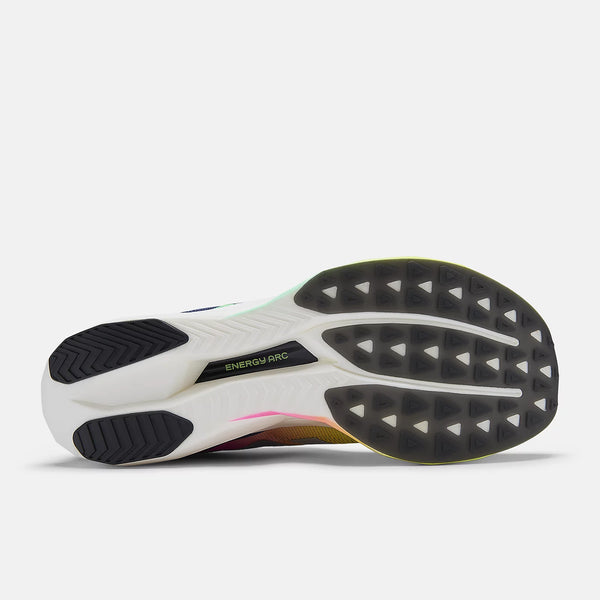 The oustole of a new balance carbon plated running shoe with the words "energy Arc" on the bottom.