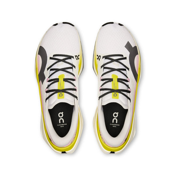 White running shoes with black and yellow accents on a white background