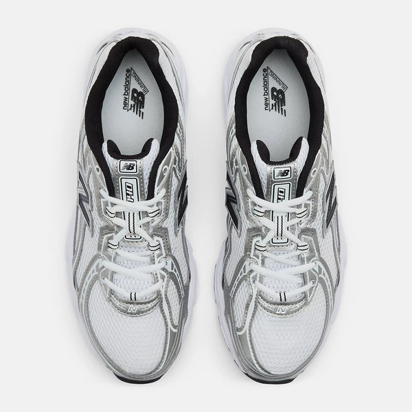 White running shoes with black accents on a white background