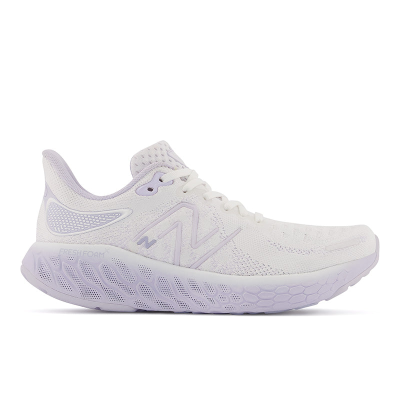 Lateral view of the Women's 1080 V12 in the color White libra/Violet Haze