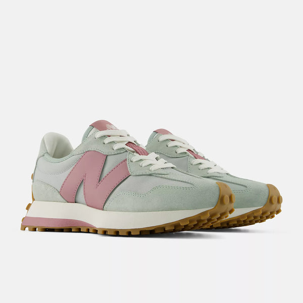 A pair of New Balance women's lifestyle shoes in grey.