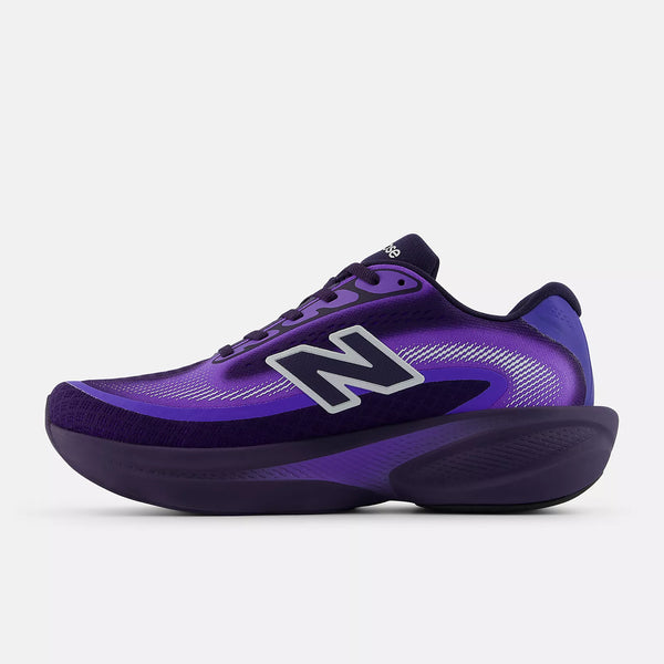 The medial side of a purple athletic shoe with New Balance logo on a white background