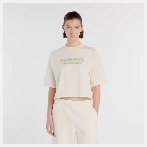 This beige t-shirt has NYC Marathon logo across the chest.