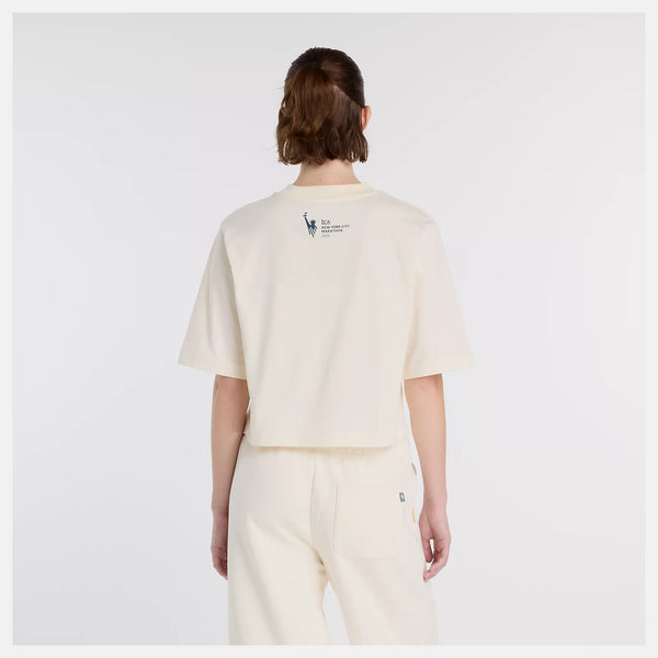 The shirt is boxy and cropped.