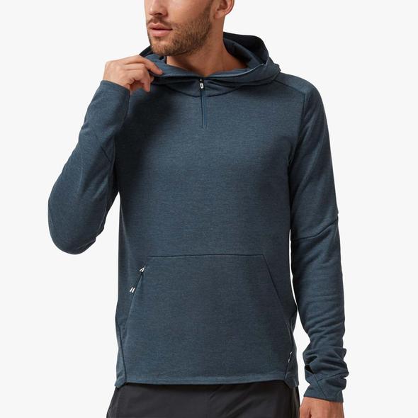 Front view of a model wearing the Men's Hoodie from ON in the color Navy
