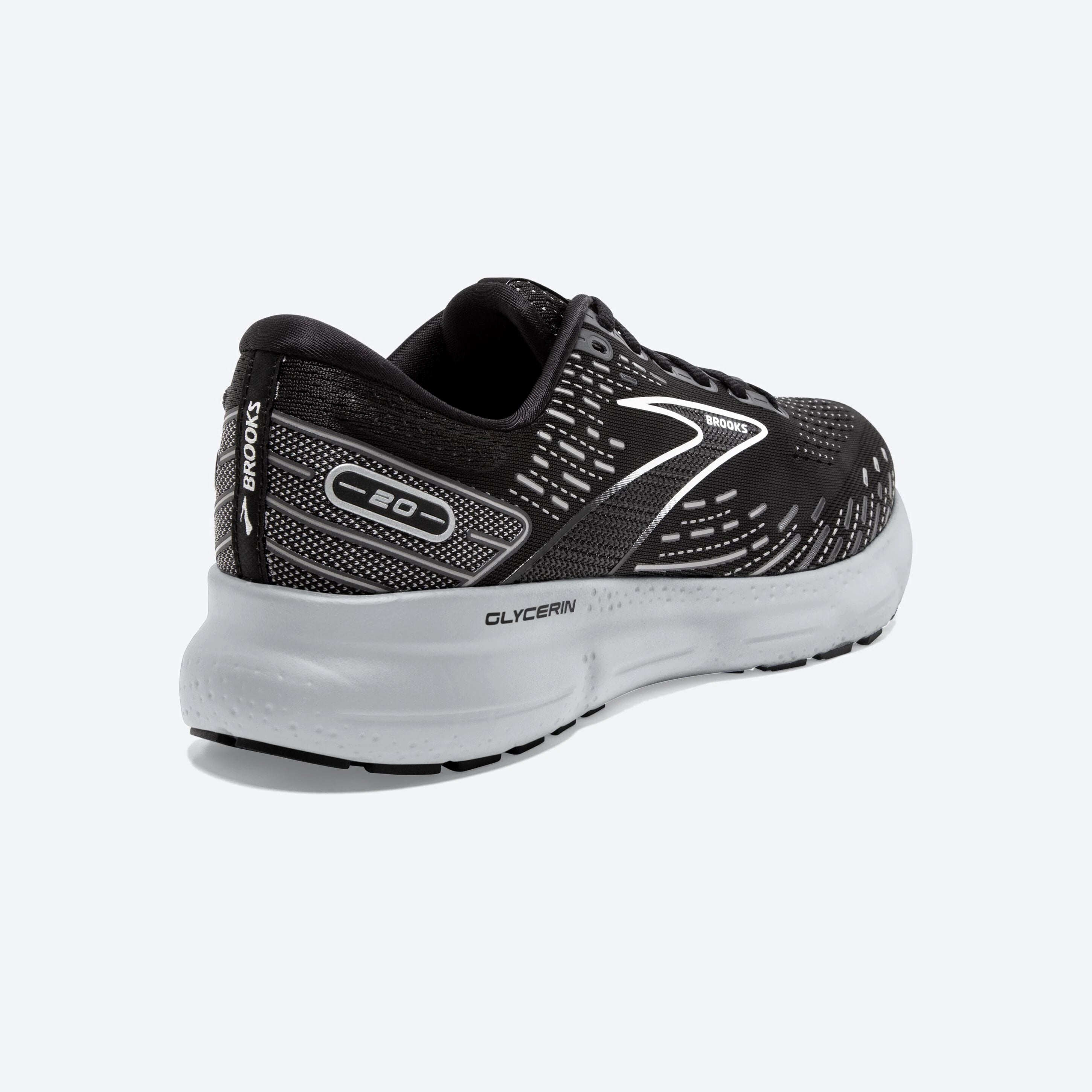 Back angle view of the Men's Glycerin 20 in the wide 2E width, color Black/white/alloy