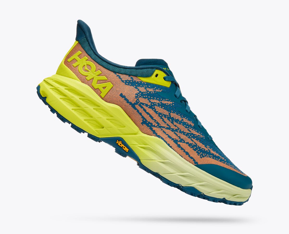 Lateral angled view of the Men's Speedgoat 5 by HOKA in the color Blue Coral / Evening Primrose