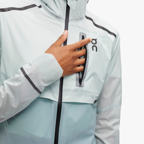  Front zoomed in view of the chest pocket on the Women's Weather Jacket by ON in the color Surf/Sea