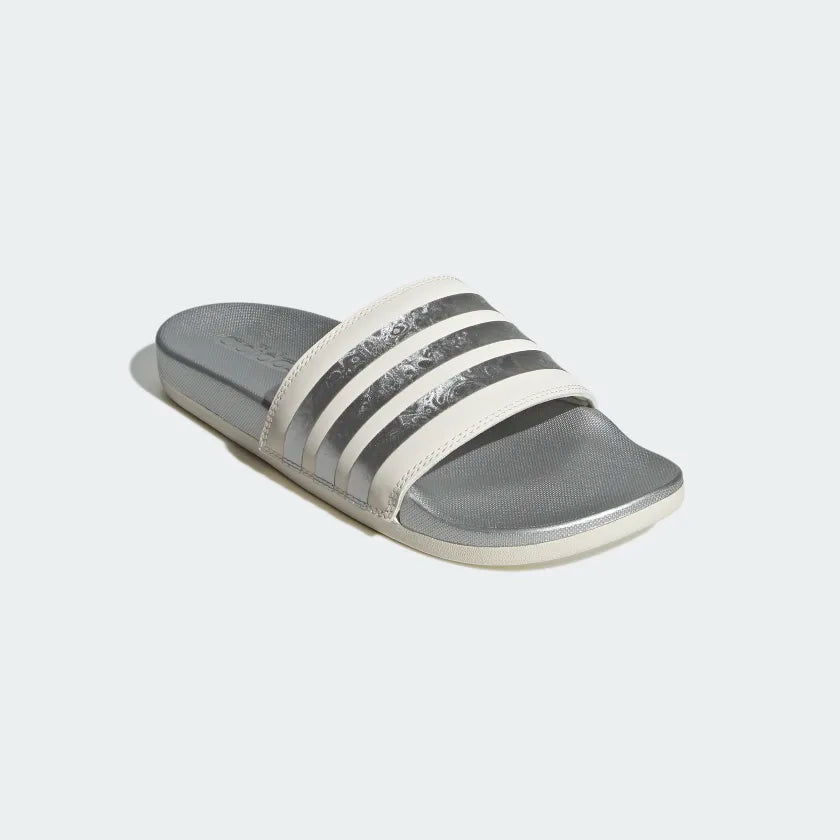 Front angle view of the Women's Adidas Adilette Comfort Slide in Chalk White/Matte Silver