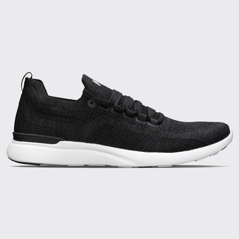 Medial view of the Women's Techloom Breeze by APL in the color Black/White