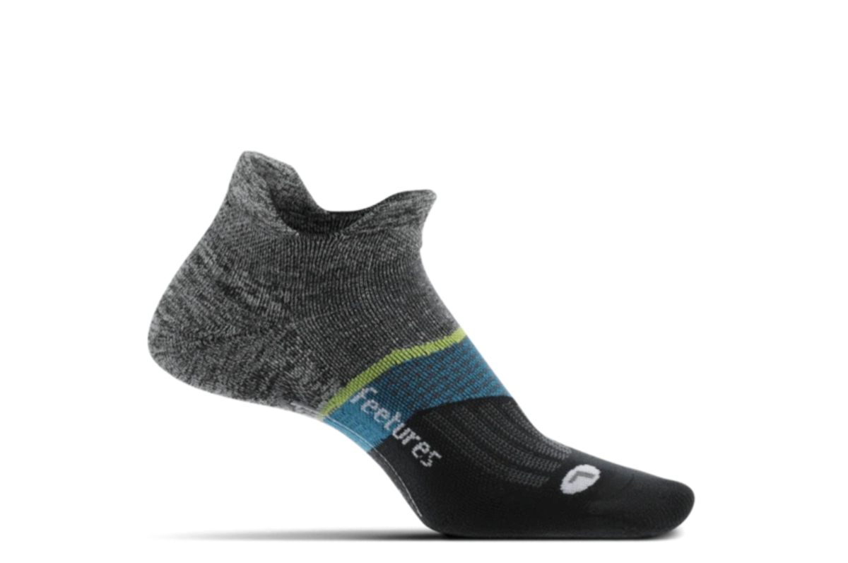 Medial view of the Feetures Elite Light Cushion no show running sock in the color brickyard grey.