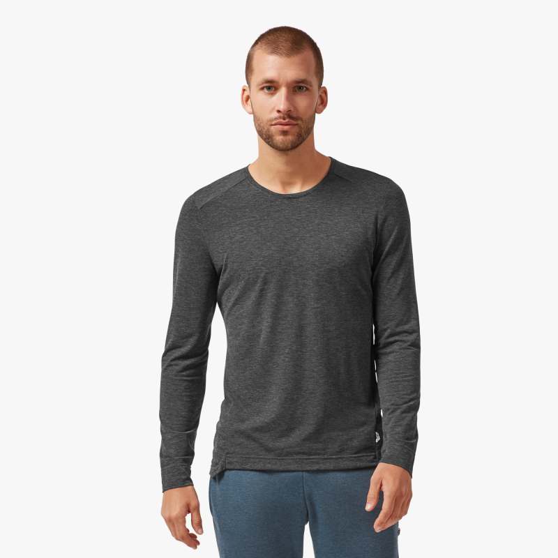 Front view of a model wearing the Men's Comfort Long Sleeve shirt by ON in the color Black