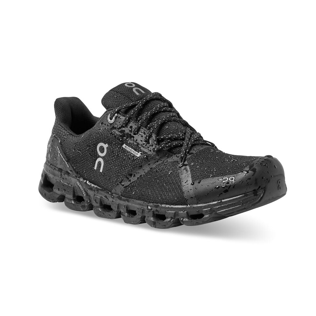 Front angled view of the Women's Cloudflyer -Waterproof by On in the color Black / Lunar