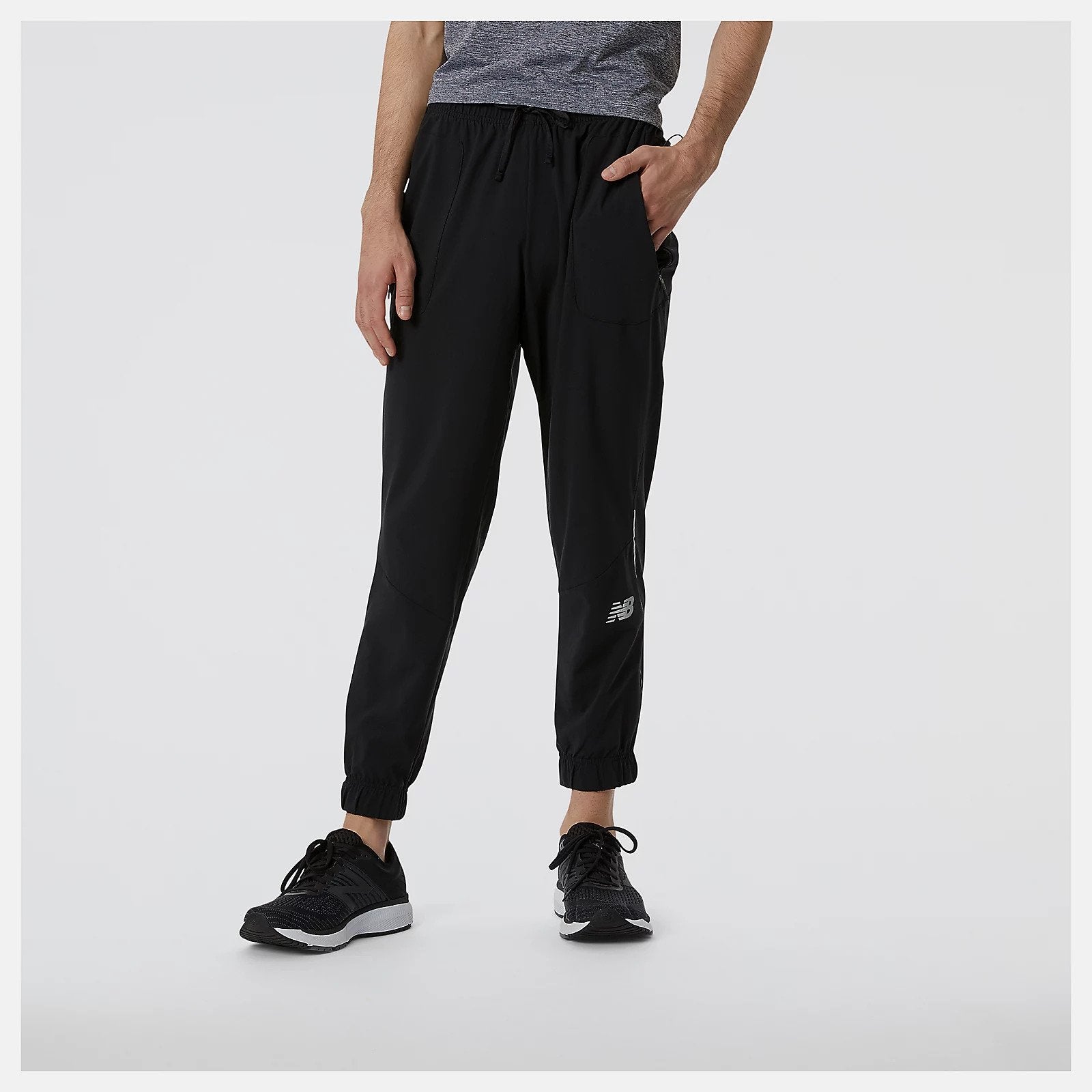 Front view of the Men's Impact Run Woven Pant by New Balance in Black
