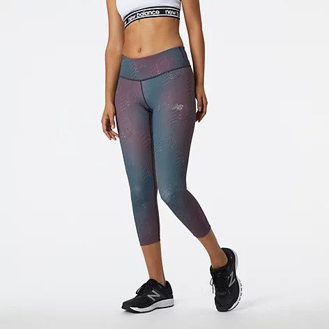Front view of a model wearing the Women's Printed Accelerate Capri by New Balance in the color Black/Multi