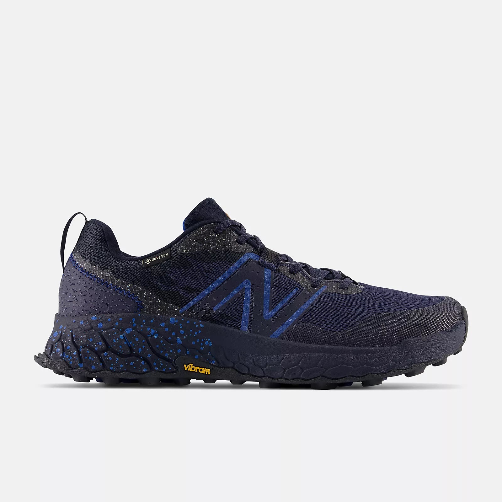 Lateral view of the Men's Hierro V7 Gortex trail runner by New Balance in the color Eclipse/Natural Indigo