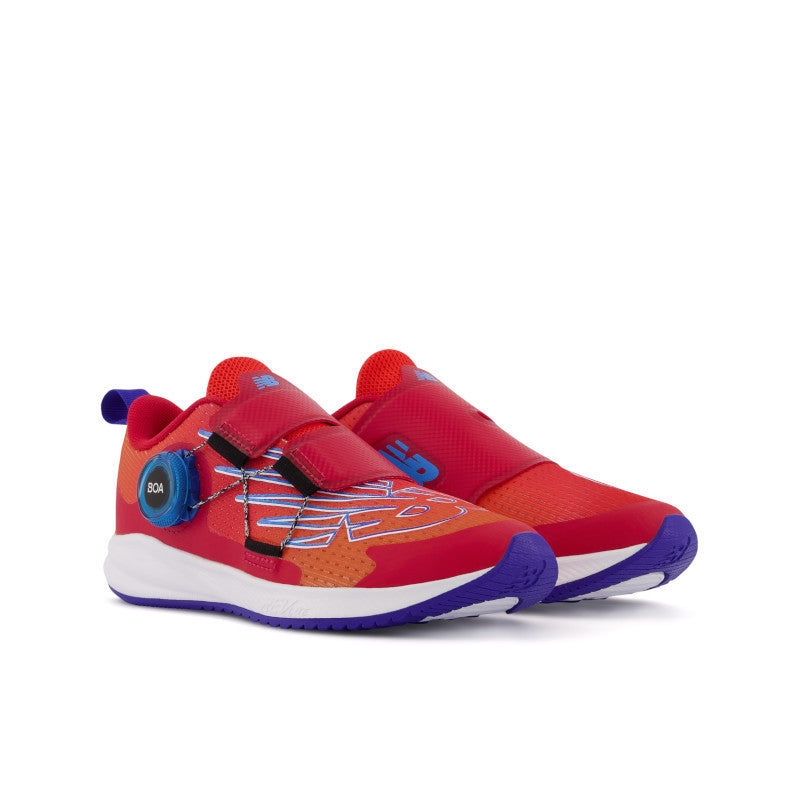 Front angled view of the Kids' New Balance FuelCore Reveal V3 Boa in the color Neo flame with team red and infinity blue